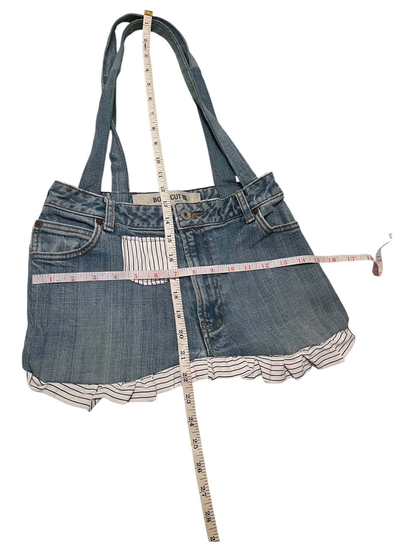 Light blue denim Jean bag with white and black stripe details