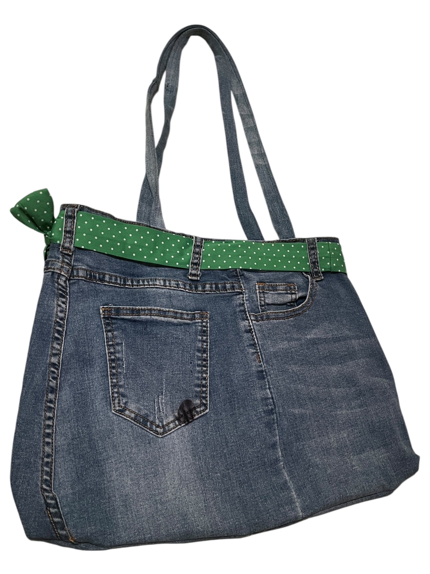 Light blue denim Jean bag with white polka dots and green.